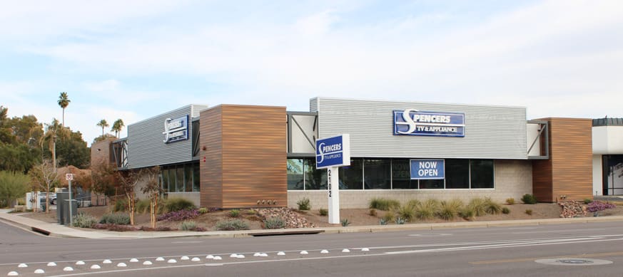 A large building with a sign on the side of it.